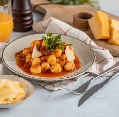 Ñoquis de Papas con Salsa Bolognesa