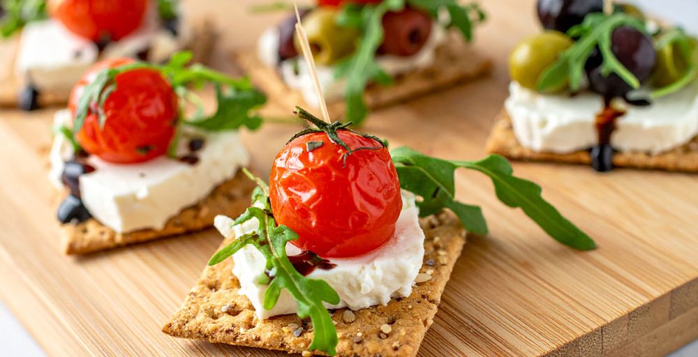 Firefly-A-gourmet-Mediterranean-inspired-snack-board-featuring-artisanal-square-crackers-made-with-g